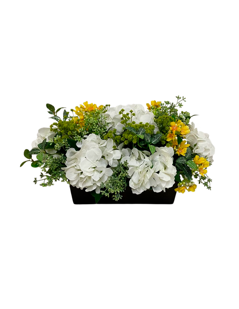 Centro de Mesa de Hidrangeas Blancas y Stephanotis con Follajes Artificiales en Base Rectangular