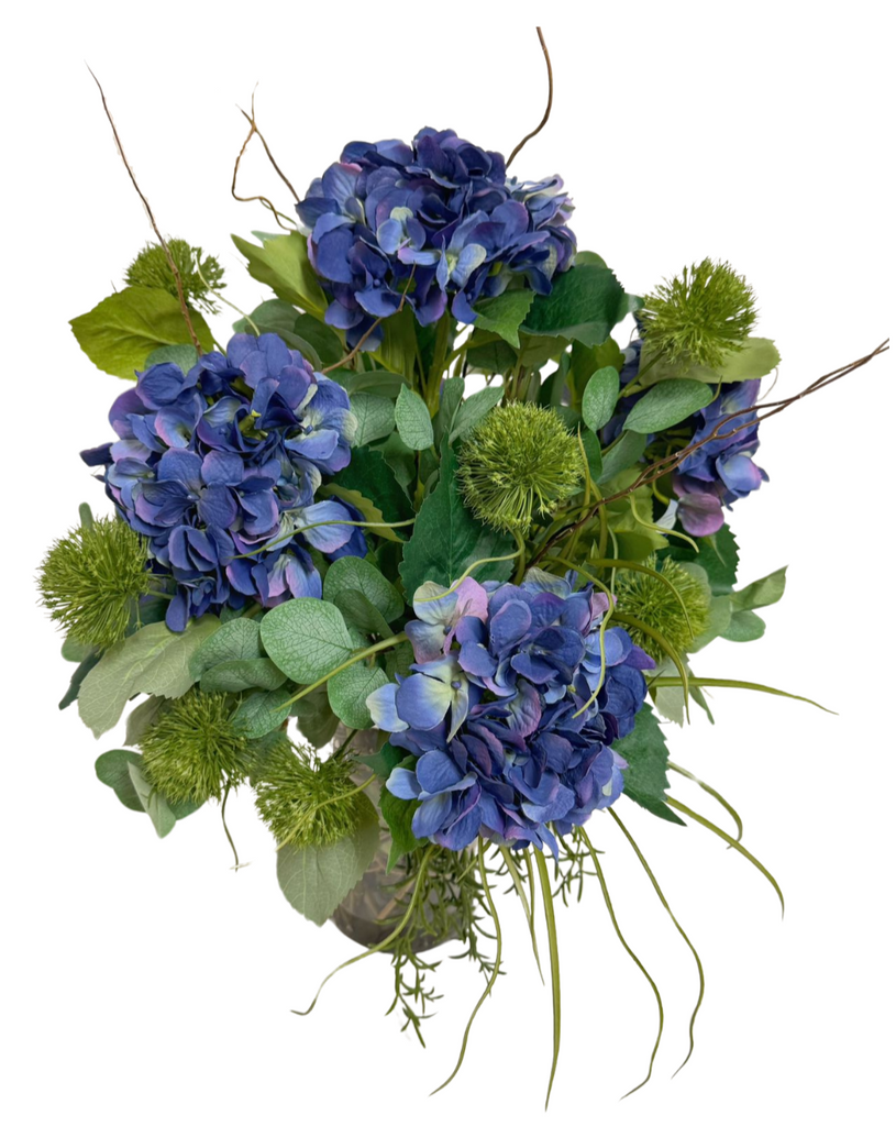 Arreglo Floral con Hidrangeas Azules Y Follajes Artificiales en Florero de Vidrio con Agua Acrílica
