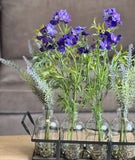 Set de 4 Botellas con Larkspur y Lavandas Artificiales en Tonos Azules en Base de Herrería con Agua Acrílica