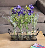 Set de 4 Botellas con Larkspur y Lavandas Artificiales en Tonos Azules en Base de Herrería con Agua Acrílica