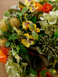 Centro de Mesa con Hidrangeas, Pansy y Follajes Artificiales