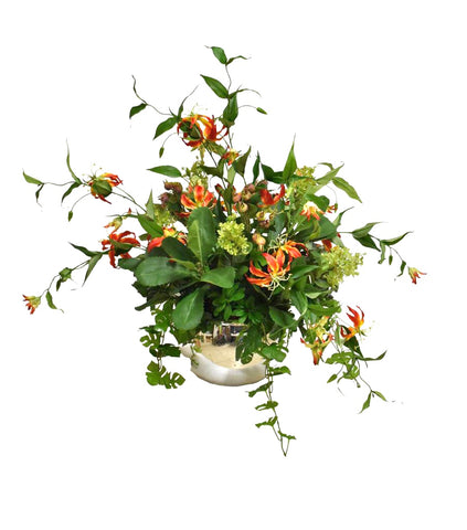 Centro de Mesa con Gloriosa Liy Follajes Artificiales en Base de Vidrio Tipo Espejo.