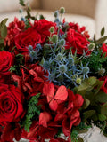 Arreglo Floral con Rosas Preservadas Rojas en Base Copa de Vidrio
