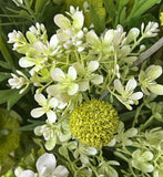 Arreglo Floral de Stephanoptis Blanco Artificial en Florero de Vidrio con Base de Herrería y Agua Acrílica